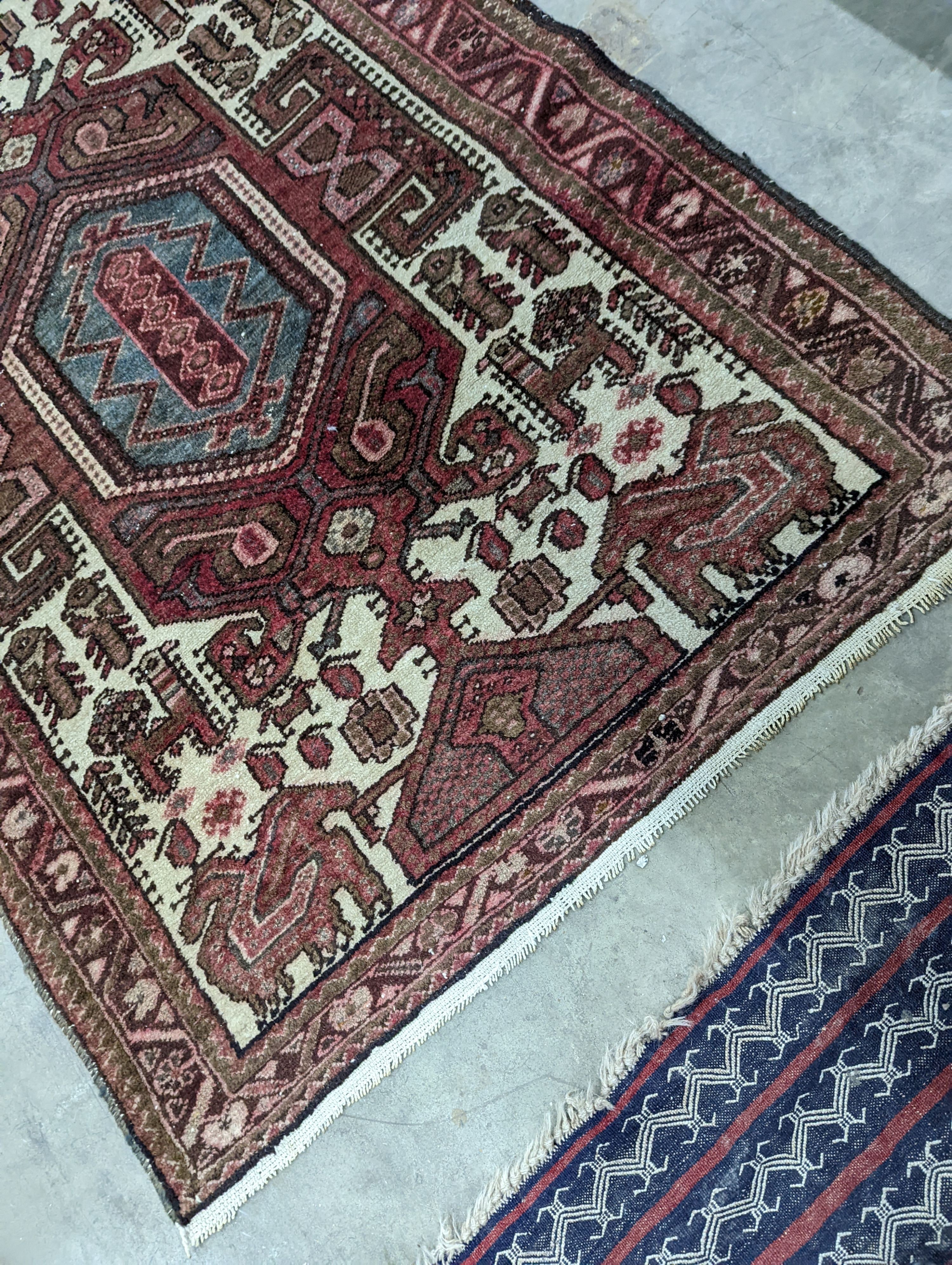 A Belouch geometric prayer rug and two Caucasian design rugs, largest 152 x 104cm